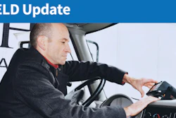 Trucker driver adjusting ELD
