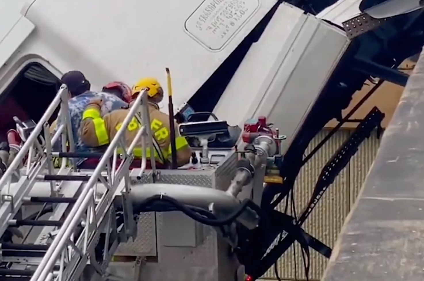 Trucker driver rescued by firefighters