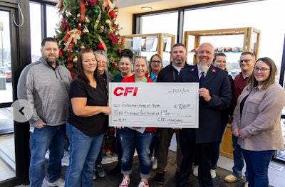 CFI employees present check to Salvation Army