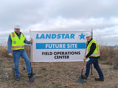 2 men breaking ground for new field operations center