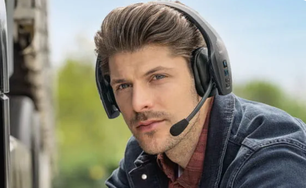 Truck driver wearing BlueParrott wireless headset
