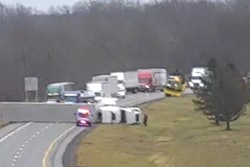 Tractor-trailer blown over by high winds