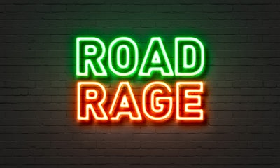 'Road Rage' in red and green on black background