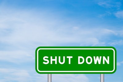 'Shut Down' on green highway sign