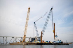 Cranes at site of bridge collapse