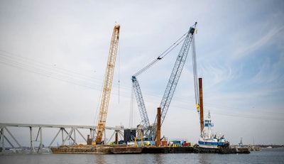 Cranes at site of bridge collapse