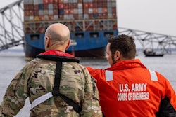 Officials survey collapsed bridge at the Port of Baltimore