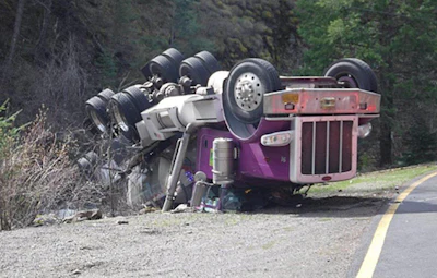 Cab of overturned tractor-trailer