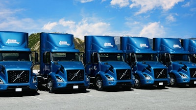 Line of Volvo electric trucks