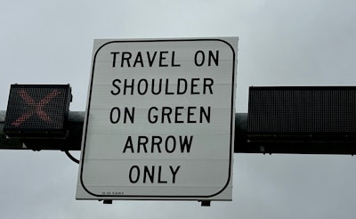 Sign allowing travel on shoulder of part of I-95