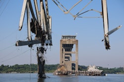 Steel from Francis Scott Key bridge being lifted from water