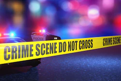 Yellow crime scene tape at night
