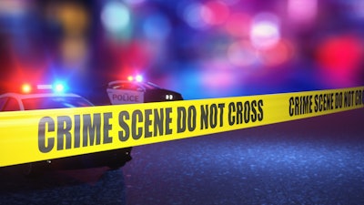 Yellow crime scene tape at night