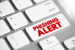 'Phishing alert' in red on white keyboard