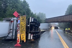 Overturned tractor-trailer with windmill blade