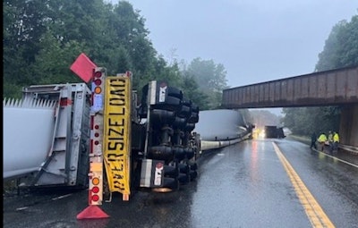 Overturned tractor-trailer with windmill blade