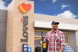 Truck driver in front of Love's