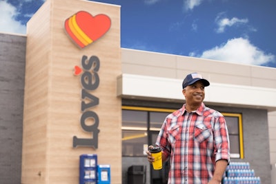 Truck driver in front of Love's