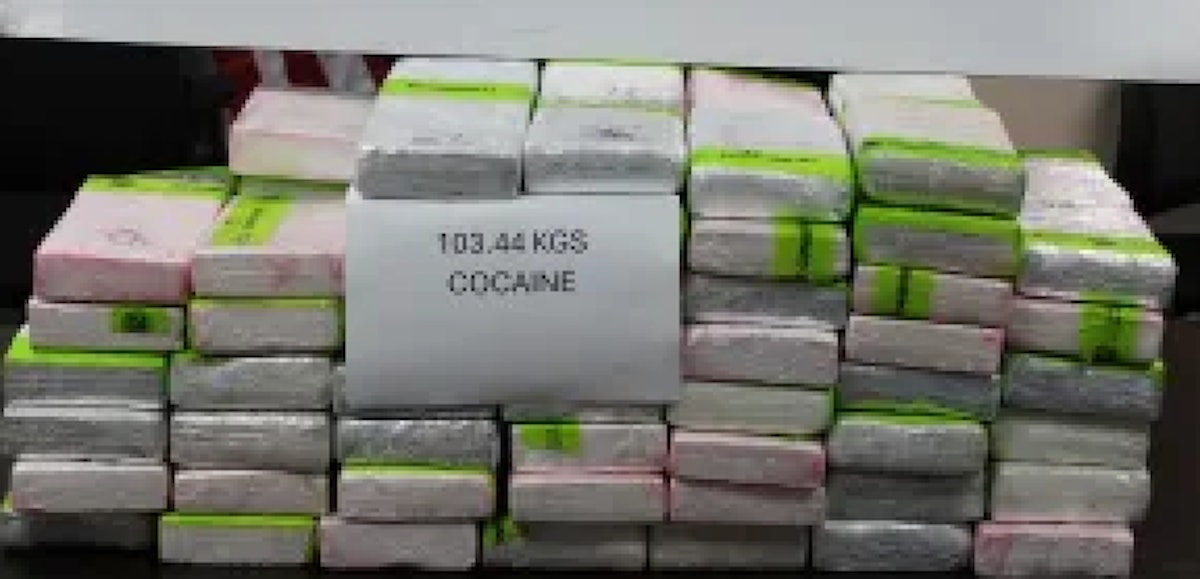 Tractor-trailer loaded with charcoal also carrying  million in cocaine