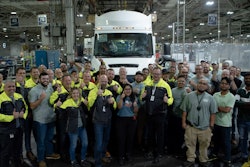 Workers with new Volvo VNL