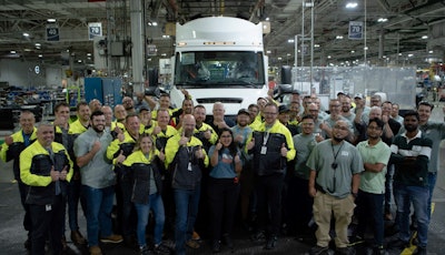 Workers with new Volvo VNL