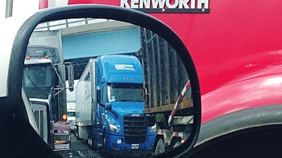Big rigs in mirror