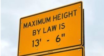 Truck height warning sign