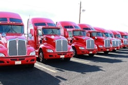 Row of Stewart Transport trucks