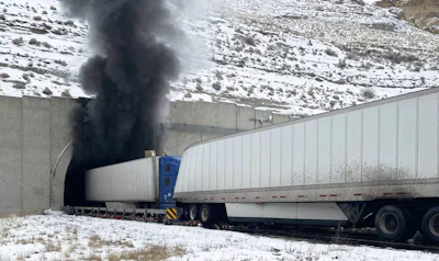 Tractor-trailers outside Green River tunnel during fire