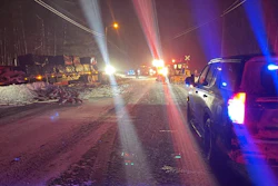 Crash scene between a tractor-trailer and a railroad snowplow