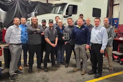 Gainsville, Georgia staff with Shop of the Year award