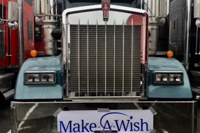 Front of truck ith Make-A-Wish sign