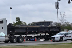 Police inspect tractor-trailer