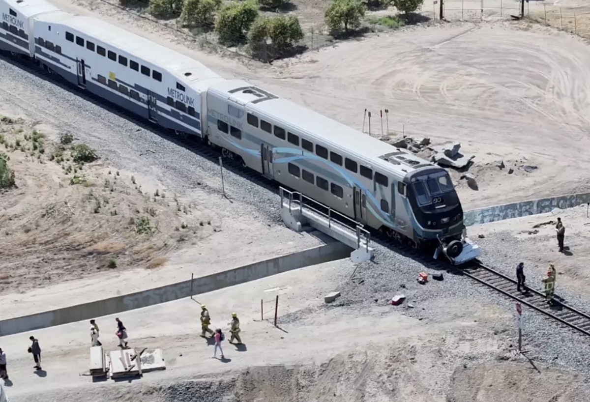 Trucker dies in collision with Calif. commuter train; one passenger hurt
