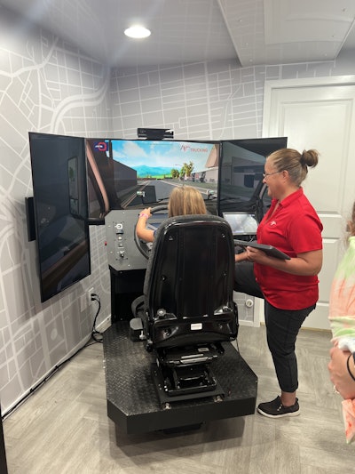 Children had the chance to use a truck driving simulator provided by Women In Trucking