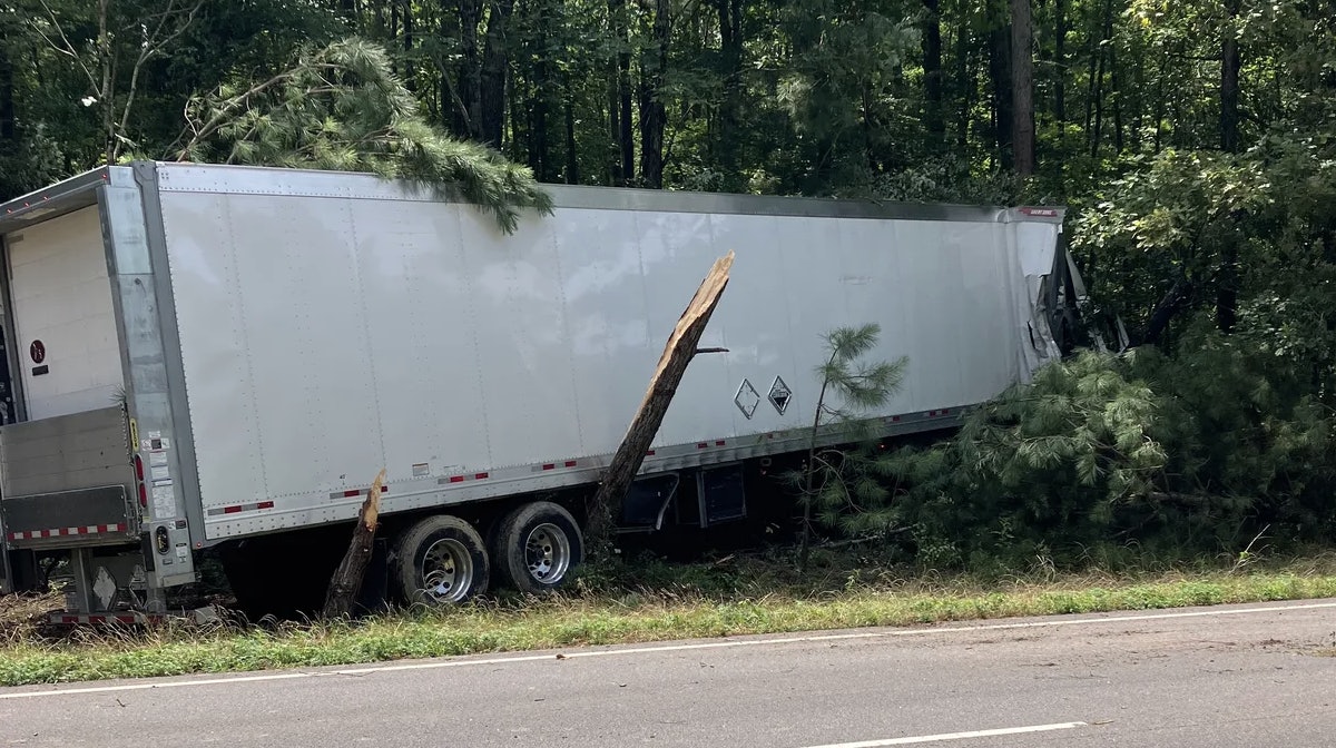 Tarp flies off truck; leads to crash and death of tractor-trailer driver