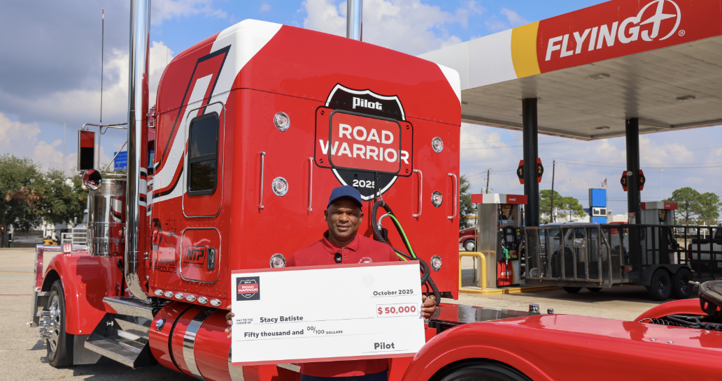 Stacy Batiste with his custom Kenworth and $50,000