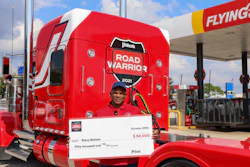 Stacy Batiste with his custom Kenworth and $50,000