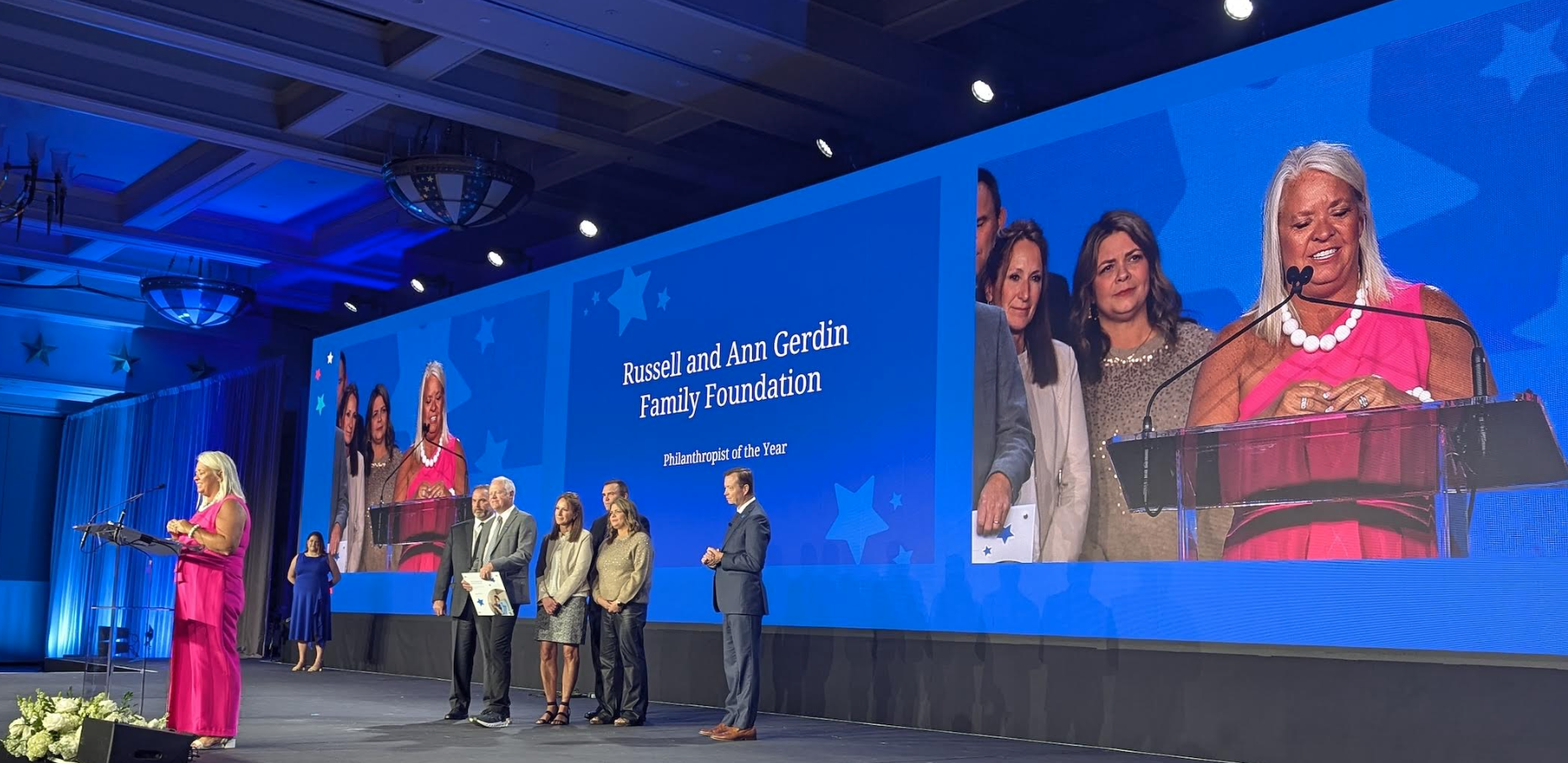 Julie Durr accepts the award on behalf of the Gerdin Family