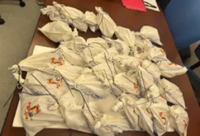 Bags filled with baby pythons