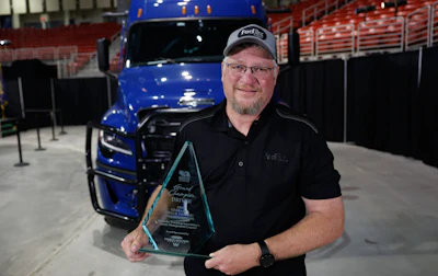 Grand Champion Paul Badgett of FedEx Freight, Inc.