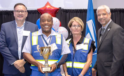 Pete Routsolias, chief logistics officer; Jeffrey McLeroy Sr., tractor-trailer operator and driving competition winner; Linda Adams, surface policy and performance executive manager; and Robert Cintron, logistics vice president
