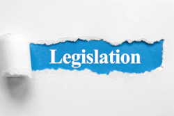 Torn white paper revealing blue banner with 'Legislation' text