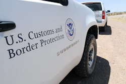 U.S. Customs and Border Protection vehicle parked in desert terrain