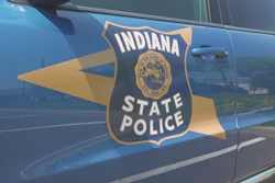 Indiana State Police badge decal on blue vehicle door