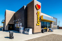 Love's Travel Stop building exterior with red heart logo and yellow signage under clear blue sky