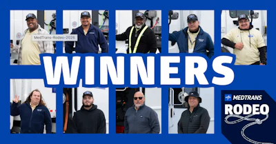MedTrans Rodeo 2026 winners group photo featuring nine team members wearing branded caps and jackets